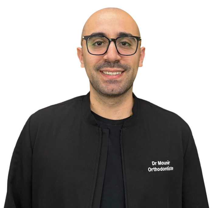 Dr Sina Mounir, orthodontist at Kanata dental practice, smiling at camera.