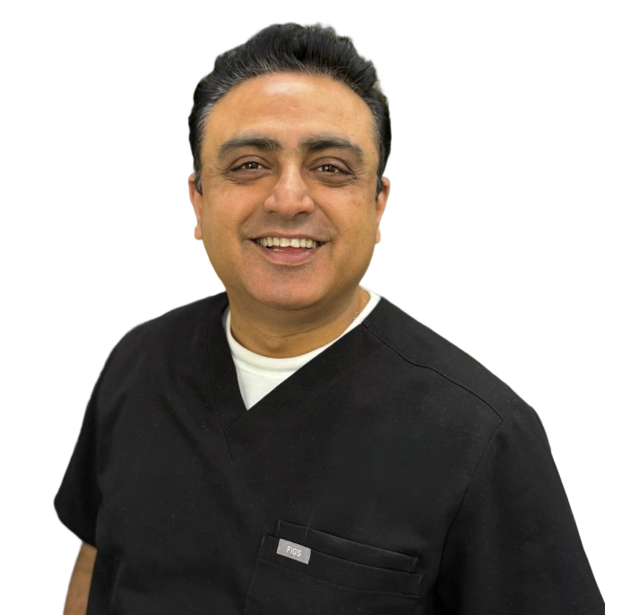 Dr. Vijayant Kapur, dentist at Kanata dental practice, smiling at camera.