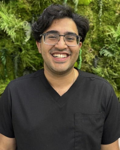 Dron Sethi, dental team member, smiling outdoors in Kanata.