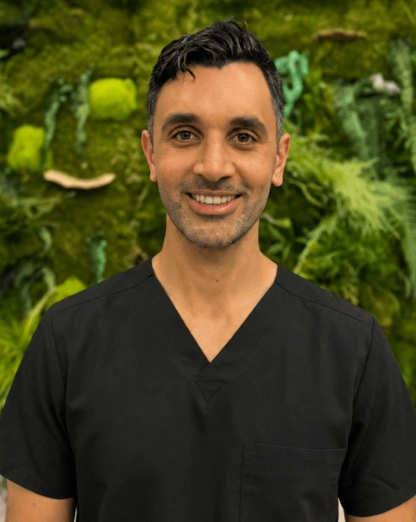 Dr. Ken Duncan, dentist at Kanata dental practice, smiling in professional portrait.