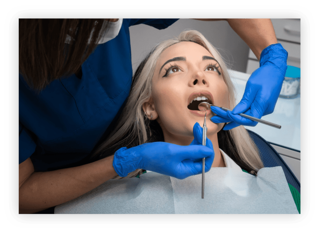 Asian Woman Getting a Dental Examination
