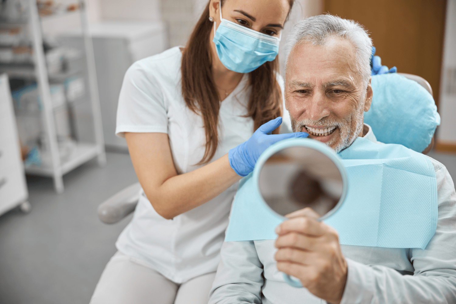 Man smiling with his new dental implants